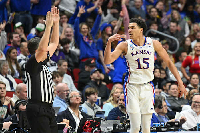 Mar 18, 2023; Des Moines, IA, USA; Kansas Jayhawks guard Kevin McCullar Jr. (15) reacts after a basket against the Arkansas Razorbacks during the second half at Wells Fargo Arena.